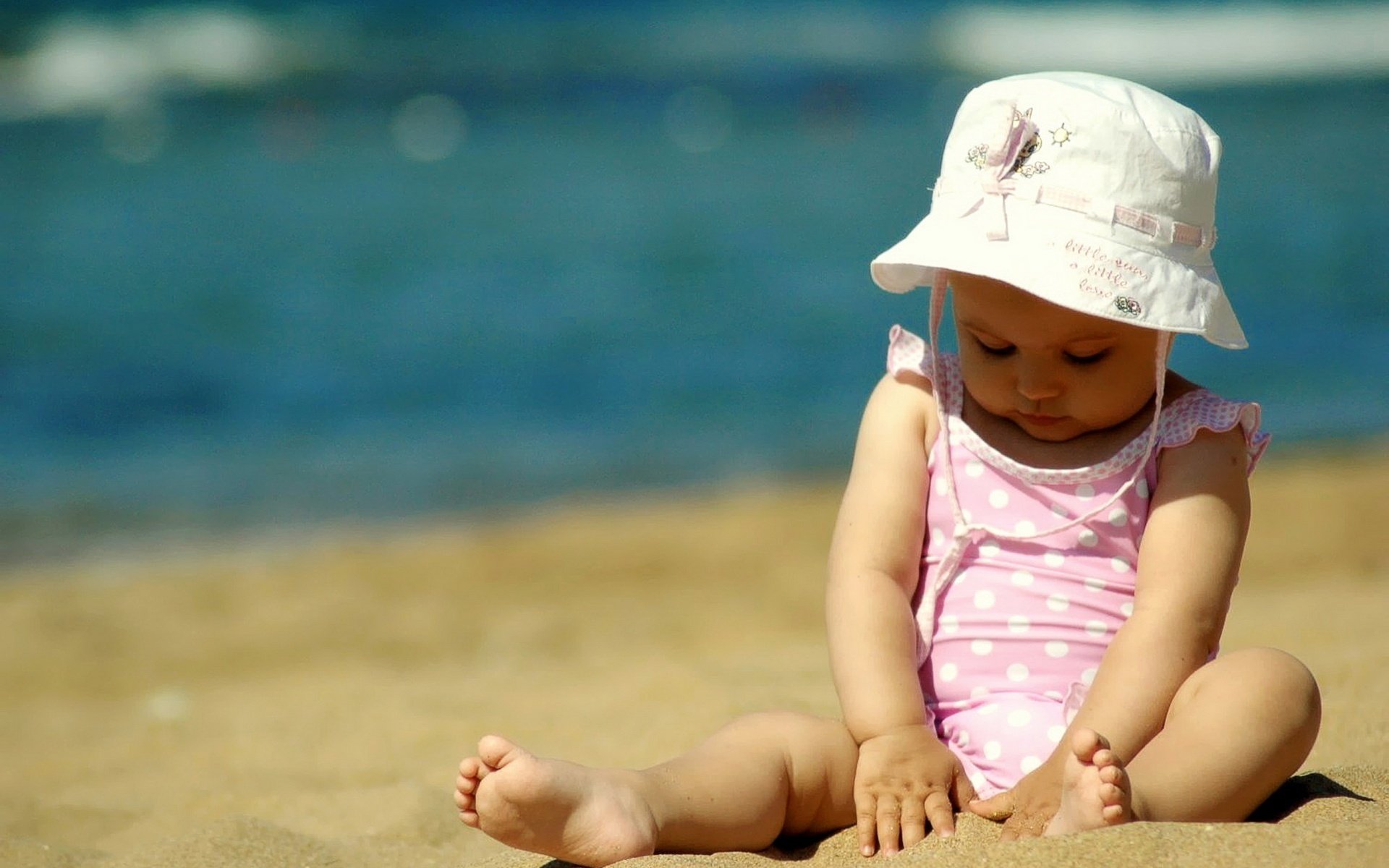 panama playing in the sand little girl