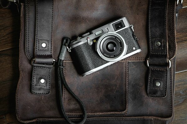 Camera camera on a leather bag