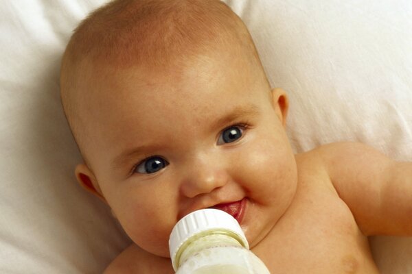 The process of feeding from a baby bottle