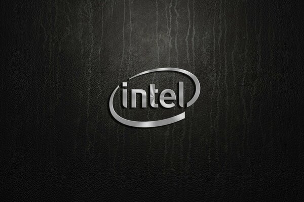 Silver Intel logo on a dark background