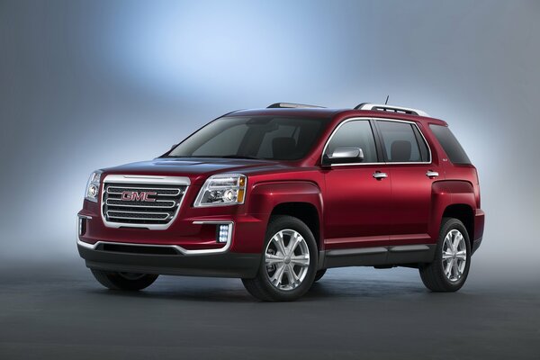 Picture of a red car on a neutral background 2015, gmc