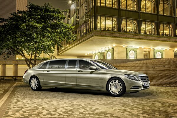 Mercedes Maybach steel color on the background of the building