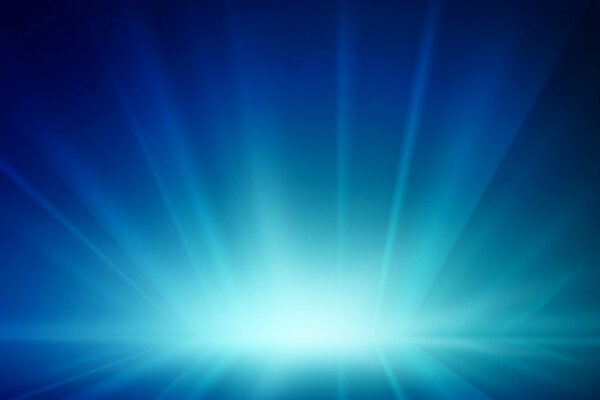 Bright radiance with rays on a blue background
