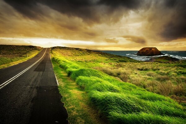 The road along the coast is beautiful: there were rocks, coast and boundless ocean around