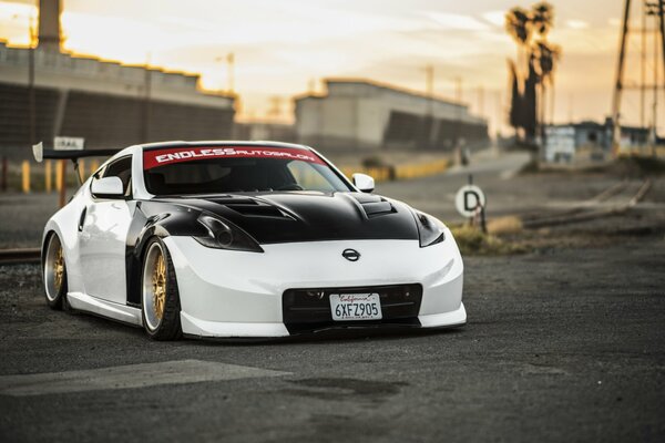 The sports car is on the playground