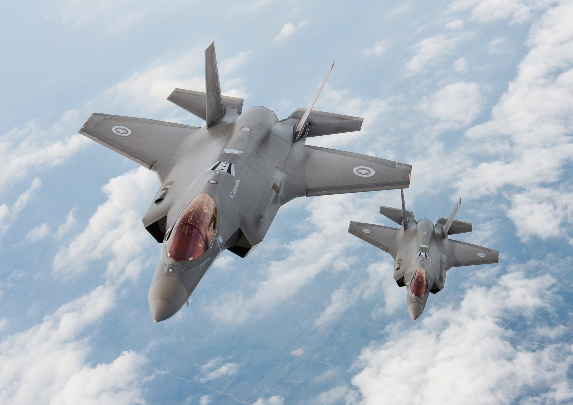 lockheed lightning canada lightning ii canada martin airplane f-35 air flight fighter clouds altitude speed military aviation military equipment aviation