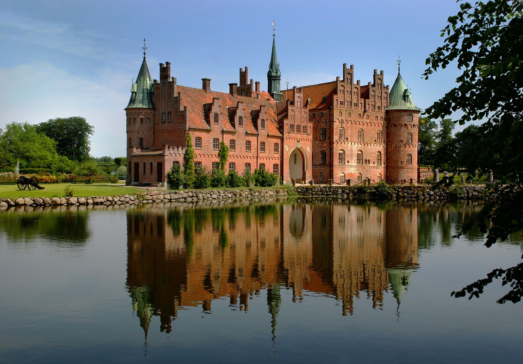 castle house water reflection grass summer sky beach tree