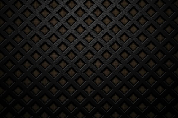 Black grille on a brown wall background