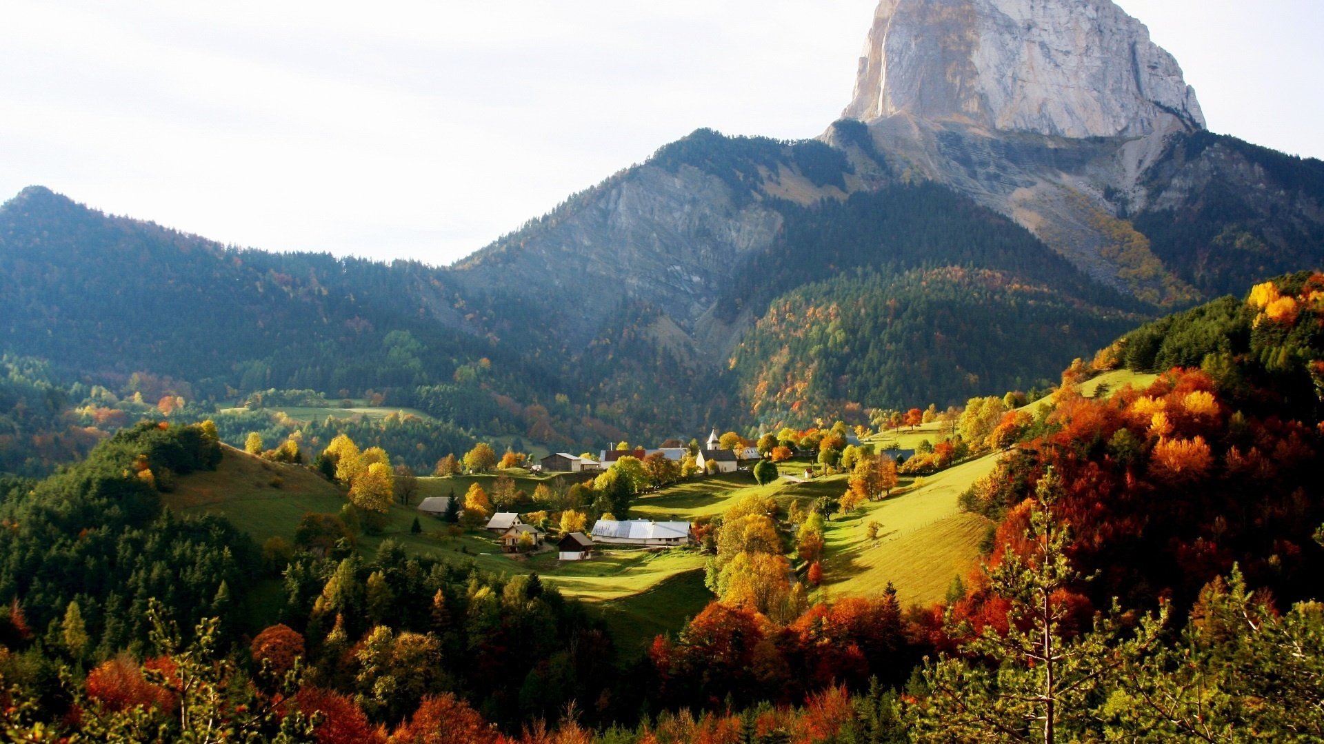 mall village mountains mounds autumn nature rock village trees forest lowland sunny day