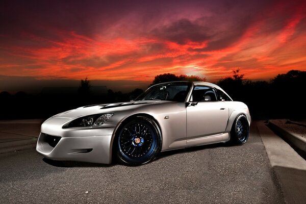 Grey s2000 honda car on the road