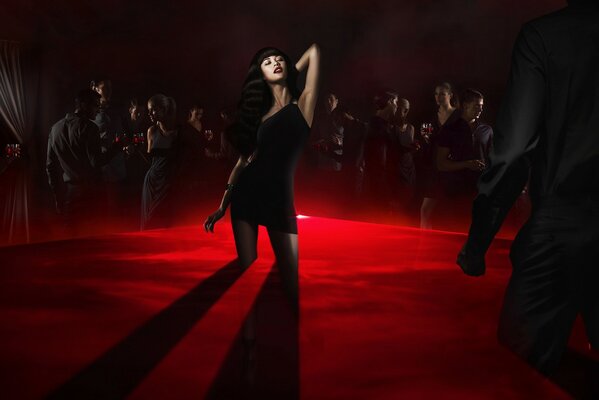 The girl at the party Olga Kurylenko in red