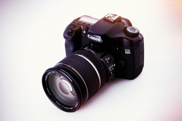DSLR in studio shooting on a light background