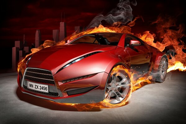 Red car on fire on the background of the road