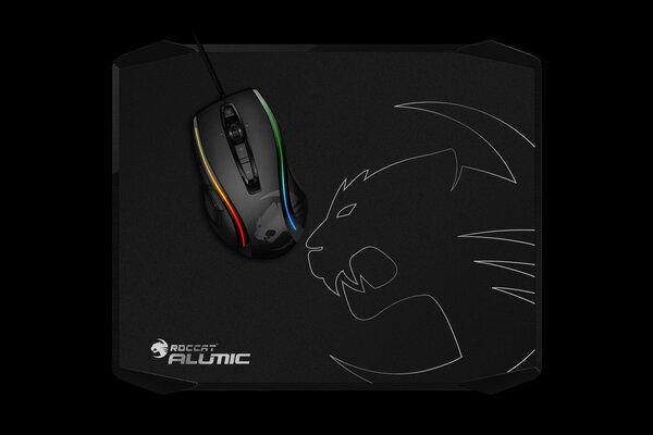 Gaming mouse on a black mat