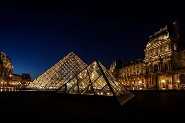Louvre Museum in Paris at night