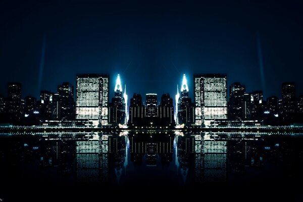 Reflection of the night city in the river