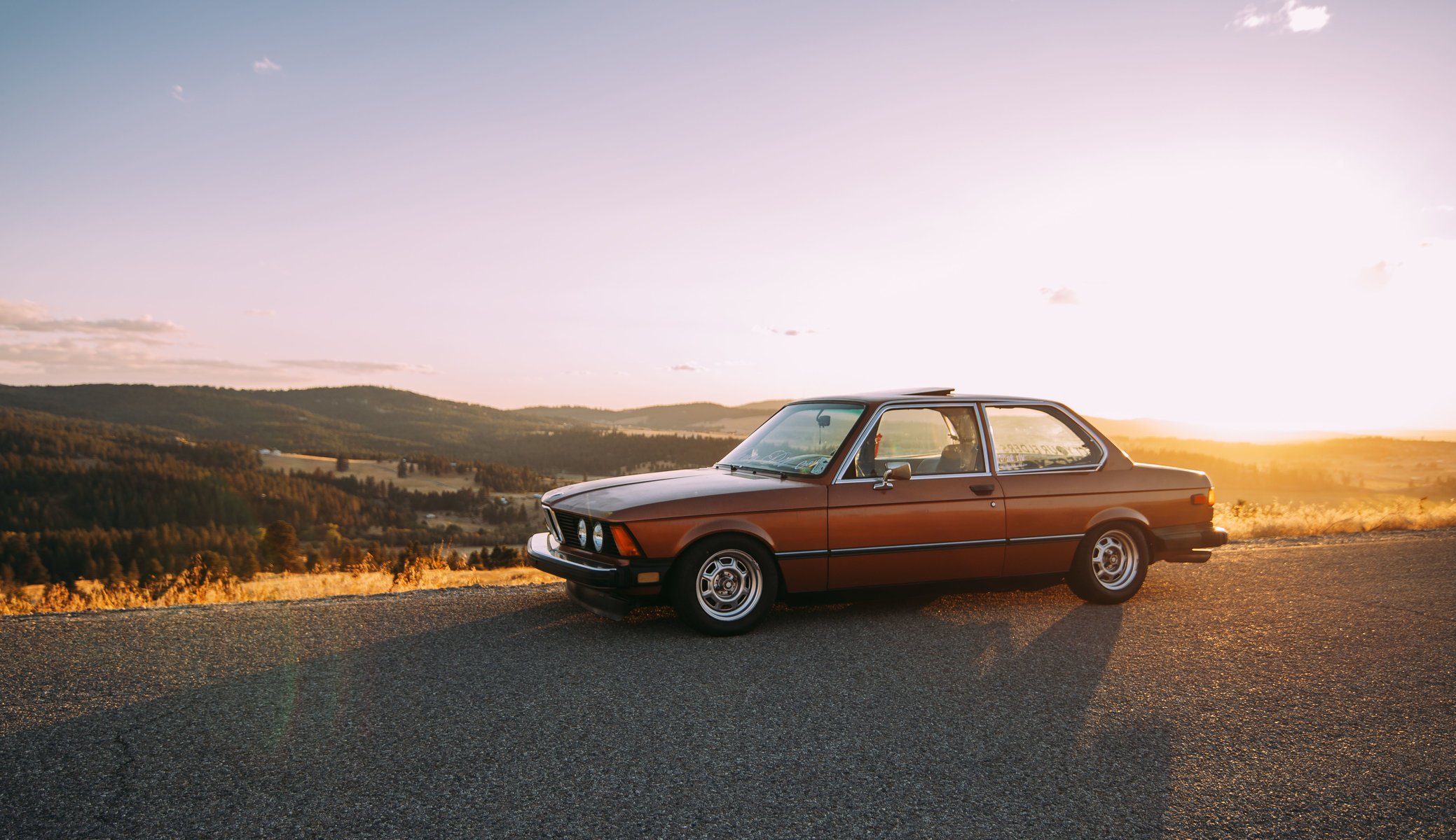 bmw e21 shadow road wheel light valley hills horizon clouds sky sun