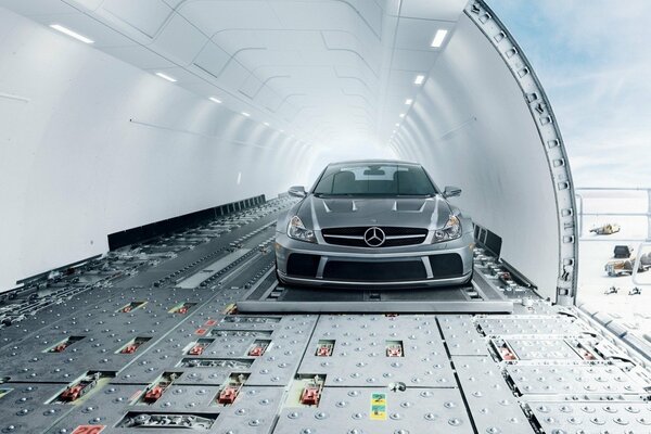 Silver Mercedes car on the plane