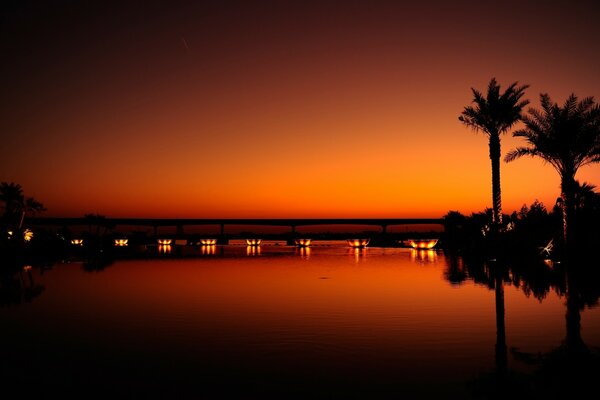 Sunset in Dubai. Reflection of light in water