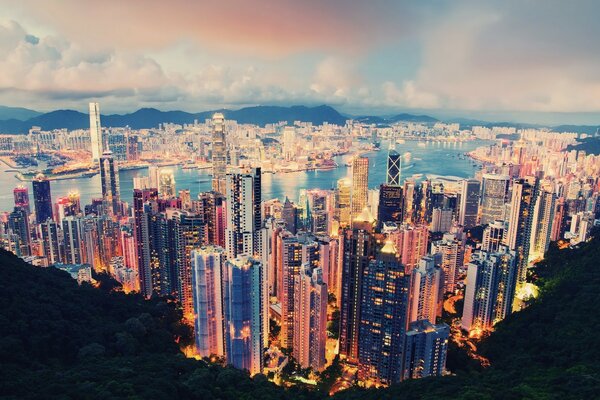 Night lights of the city under the clouds
