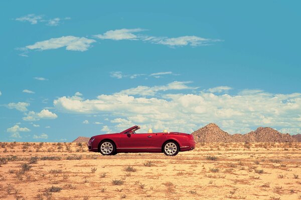 Bentley car in the desert under the rubble