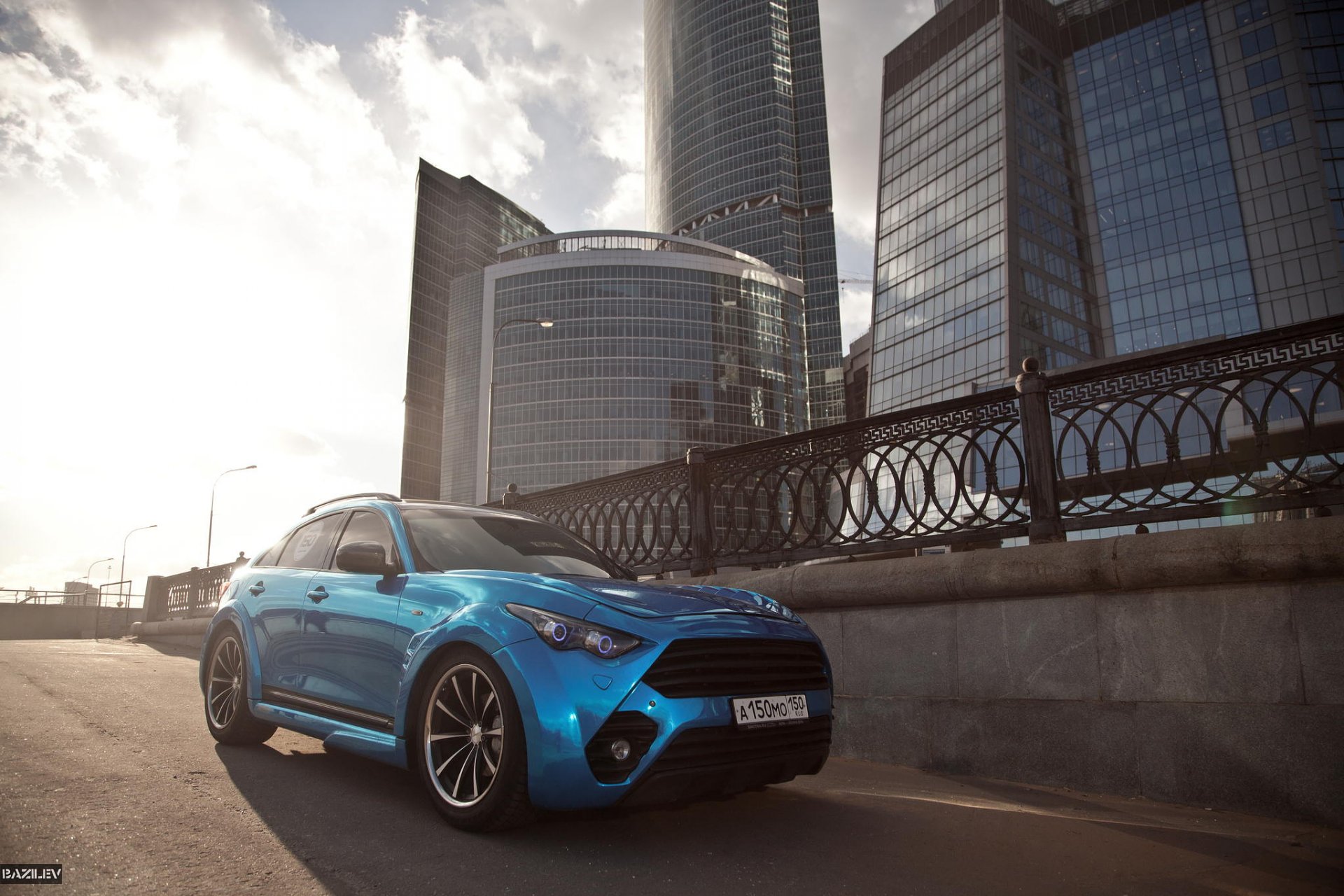 alex bazilev photographer infiniti fx50 blue drives sunset