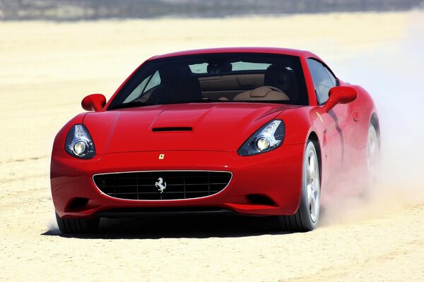 Red Ferrari on the move in the desert