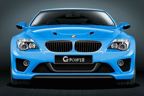 Powerful blue supercar bmw m6_g rushes towards us