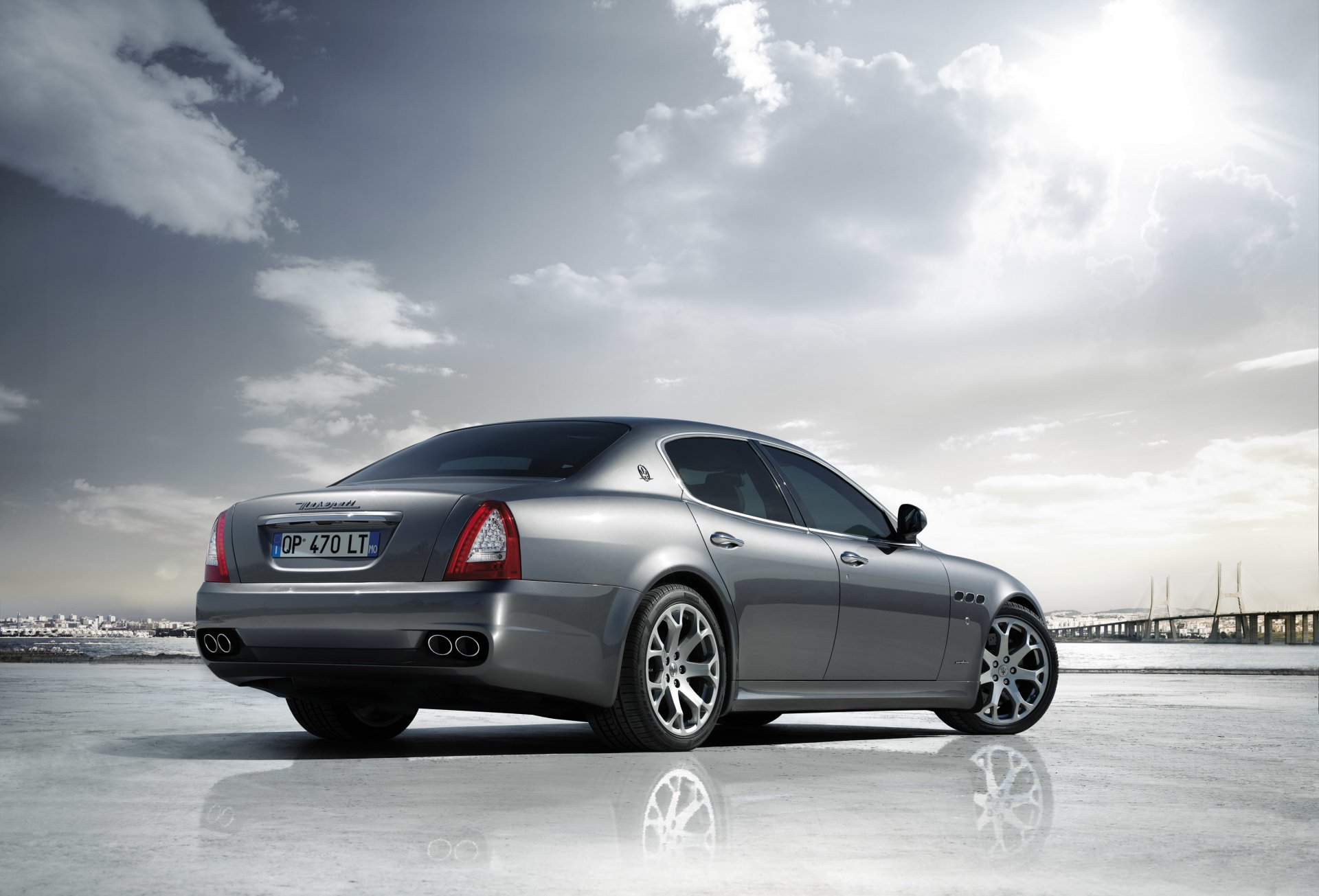 maserati quattroporte silver sky sun machine reflection