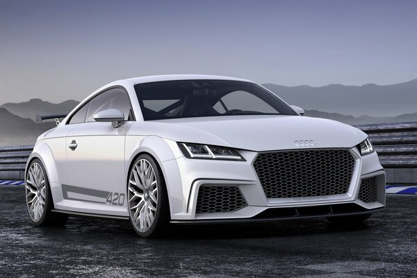 White Audi TT Quattro car on the highway