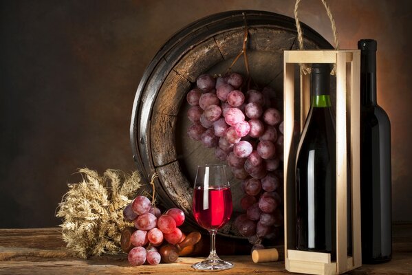 Wine in a glass and grapes