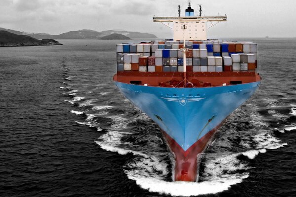 Cargo ship with containers at sea