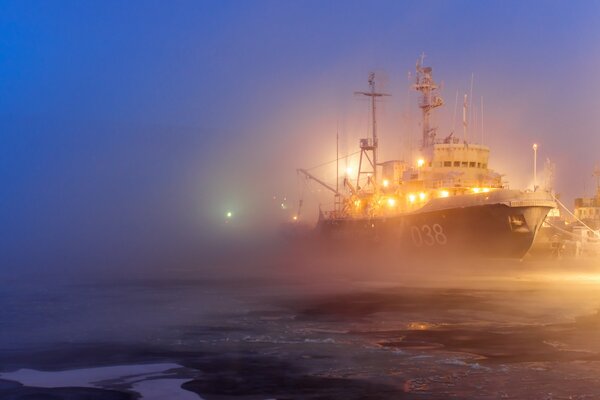 Image of a ship on a fog background