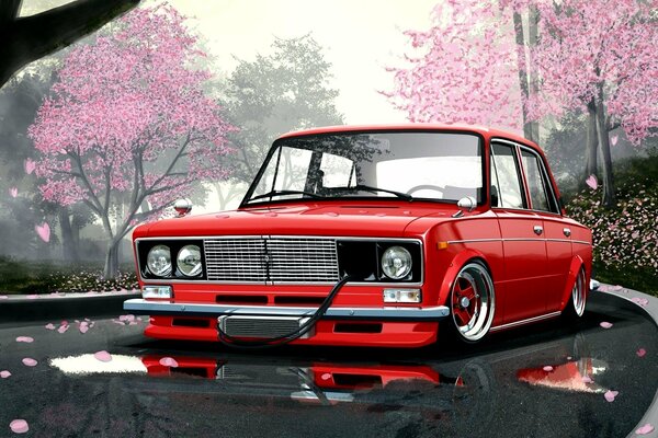 Red car on the road among the cherry trees