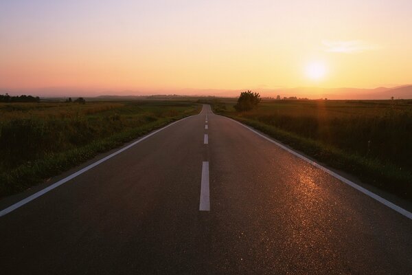 The road into the distance sunset is beautiful