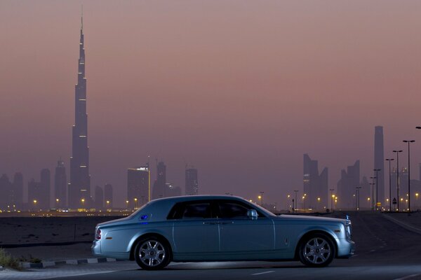 Rolls-Royce Phantom 102ex car on the background of a night city
