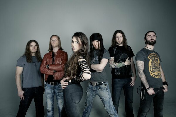 Metal band musicians on a gray background