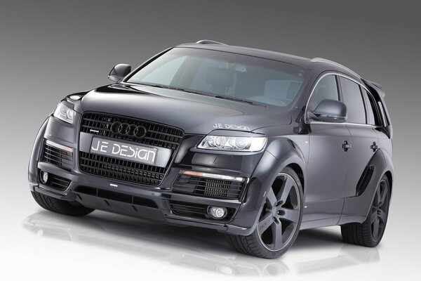 Grey Audi on a gradient light background