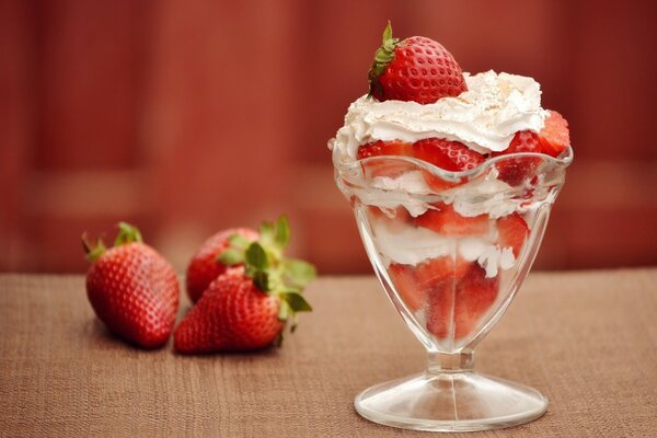 Strawberry dessert and berries on the table