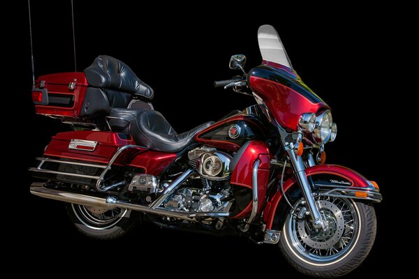 Red and black harley-davidson bike