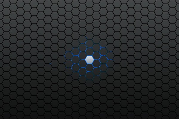 A glowing point of a hexagon on a background of gray honeycombs