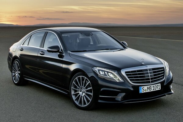 Mercedes Benz on an empty paved area