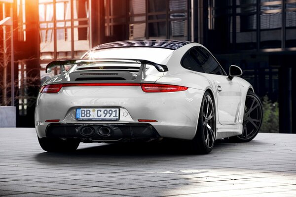 White Porsche in a beautiful parking lot