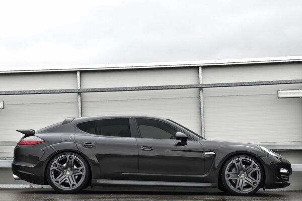 Black Porsche Panamera on gray