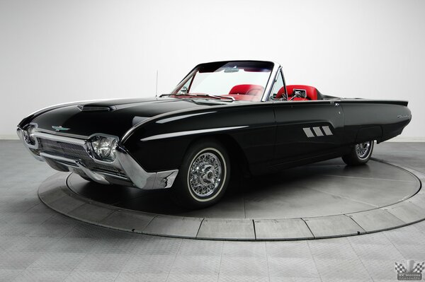 Classics are always in fashion. Black Ford convertible