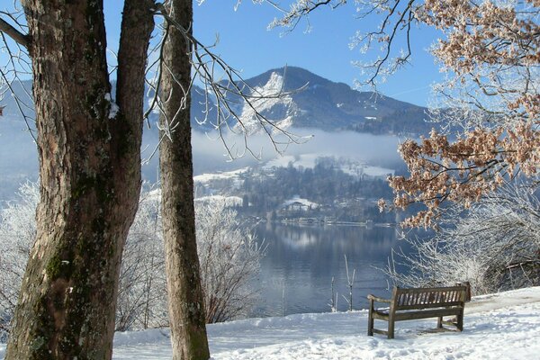 A snow-covered lonely shop near the lake