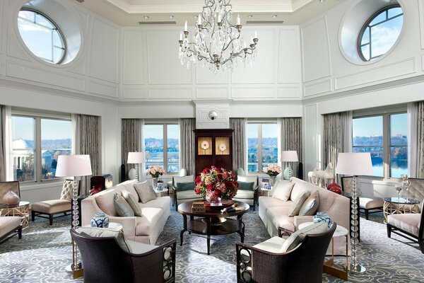 Stylish bright living room with high ceilings