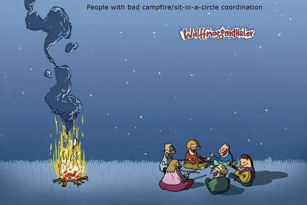 Picnic at night by a warm campfire