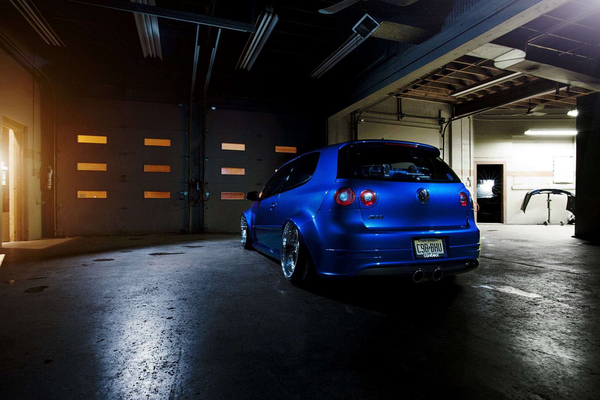 volkswagen golf gti blue tuning drives back of