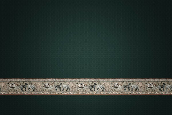 Beige line with sheep on a green background